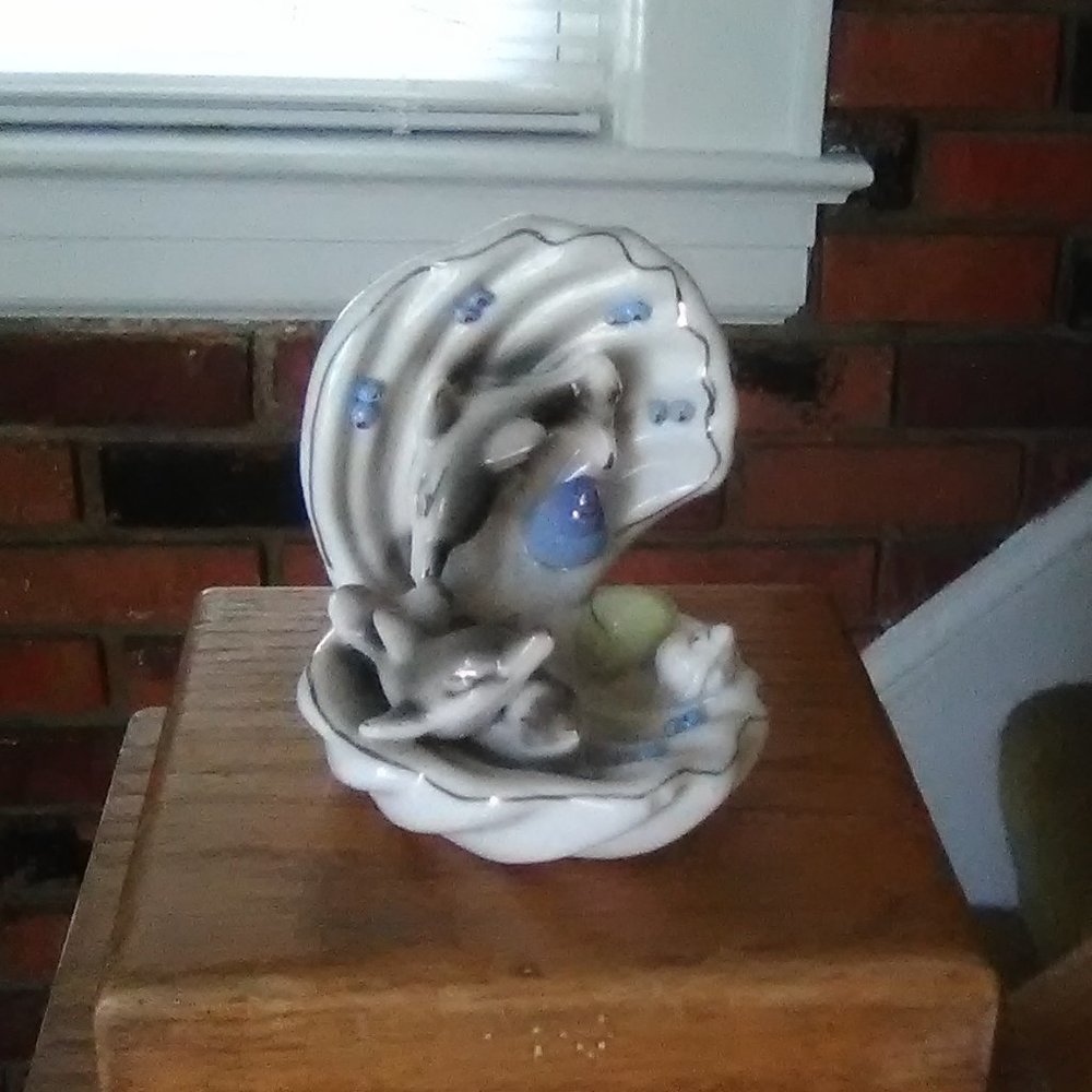 Dolphins in a Seashell Figurine
